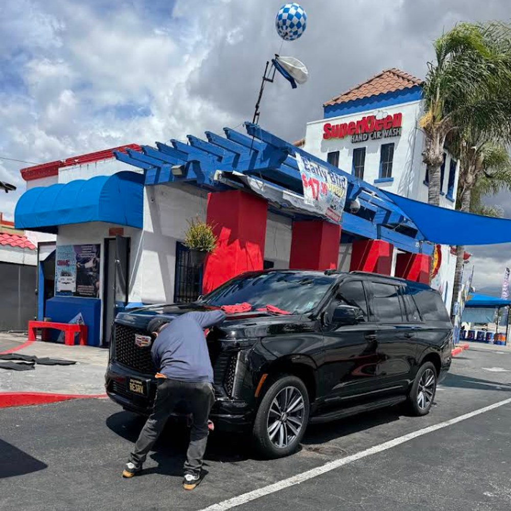 Cadillac Escalade getting a premium hand wash at SuperKleen